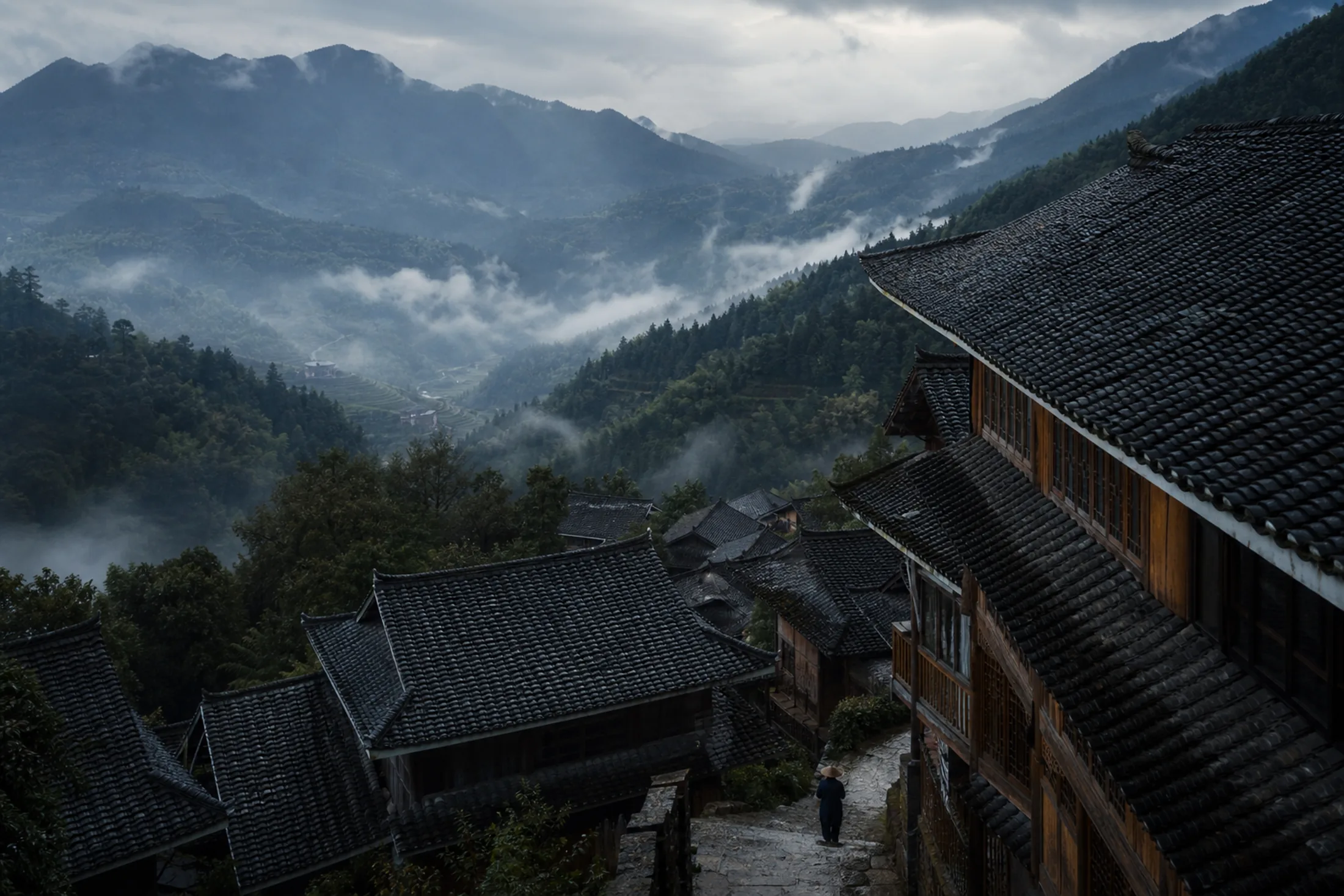 Misty valleys and wooden architecture in Guizhou