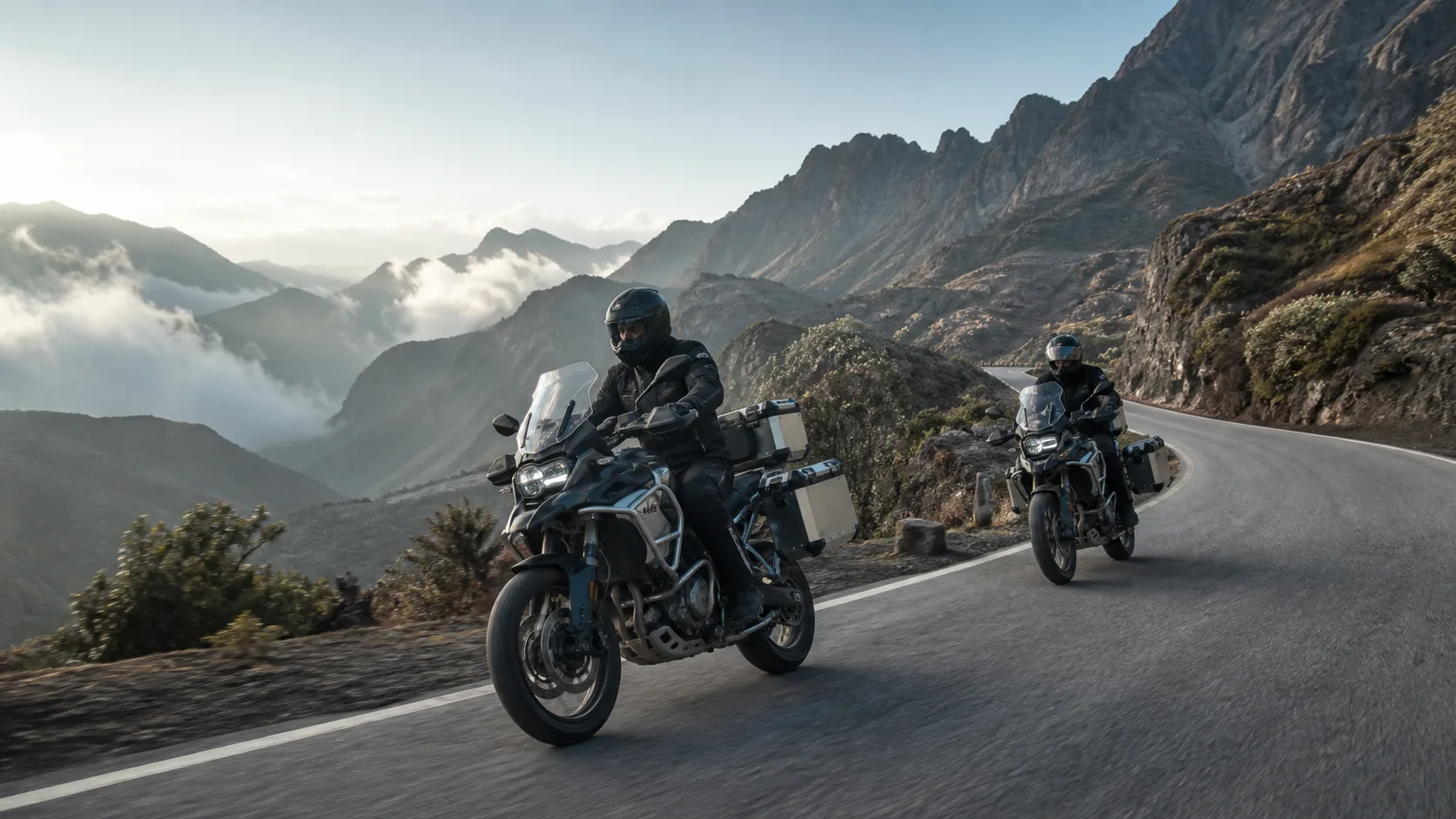 Motorcycle riders crossing a mountain road in Yunnan
